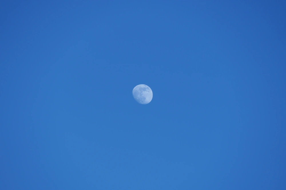 Moon in the blue sky