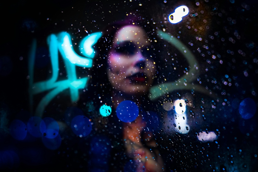 Behind the Rainy Glass